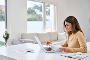 an entrepreneur creating a financial planing checklist for herself and her entrepreneurial needs.